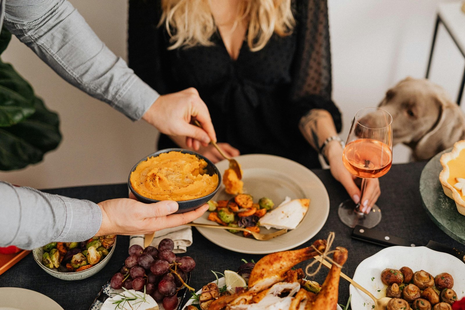 A cozy dinner scene featuring a variety of delicious dishes and a relaxing atmosphere.